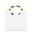 Front of a white ostrich textured handbag on a white background