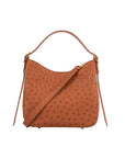Cognac ostrich-textured handbag on a white background