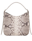 Snakeskin pattern handbag on a white background