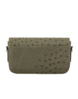 Back of a forest green ostrich textured handbag on a white background