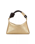 Gold handbag with a knotted handle on a white background