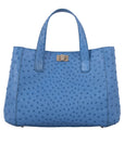 Blue ostrich-textured tote bag on a white background