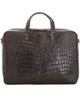 Large dark brown crocodile laptop bag with handles on a white background