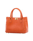 Orange textured handbag with gold hardware on a white background