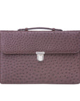 Ostrich textured briefcase with a silver clasp on a white background