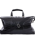 Large black crocodile bag with straps on a white background