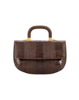 Front of a brown textured handbag with gold accents and a wooden handle on a white background