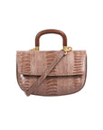 Brown ostrich leg skin handbag with wooden handle on a white background