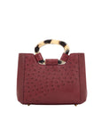 Back of maroon ostrich handbag with a handle on a white background