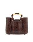 Brown textured handbag with a handle on a white background