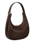 Side of a nicotene ostrich handbag on a white background