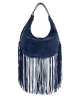 Navy blue suede handbag with fringe details on a white background