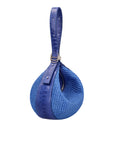 Blue woven handbag on a white background