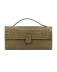 Front of crocodile forest green textured clutch bag on a white background