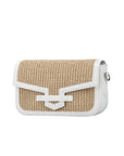 Side of a beige woven handbag with white trim on a white background
