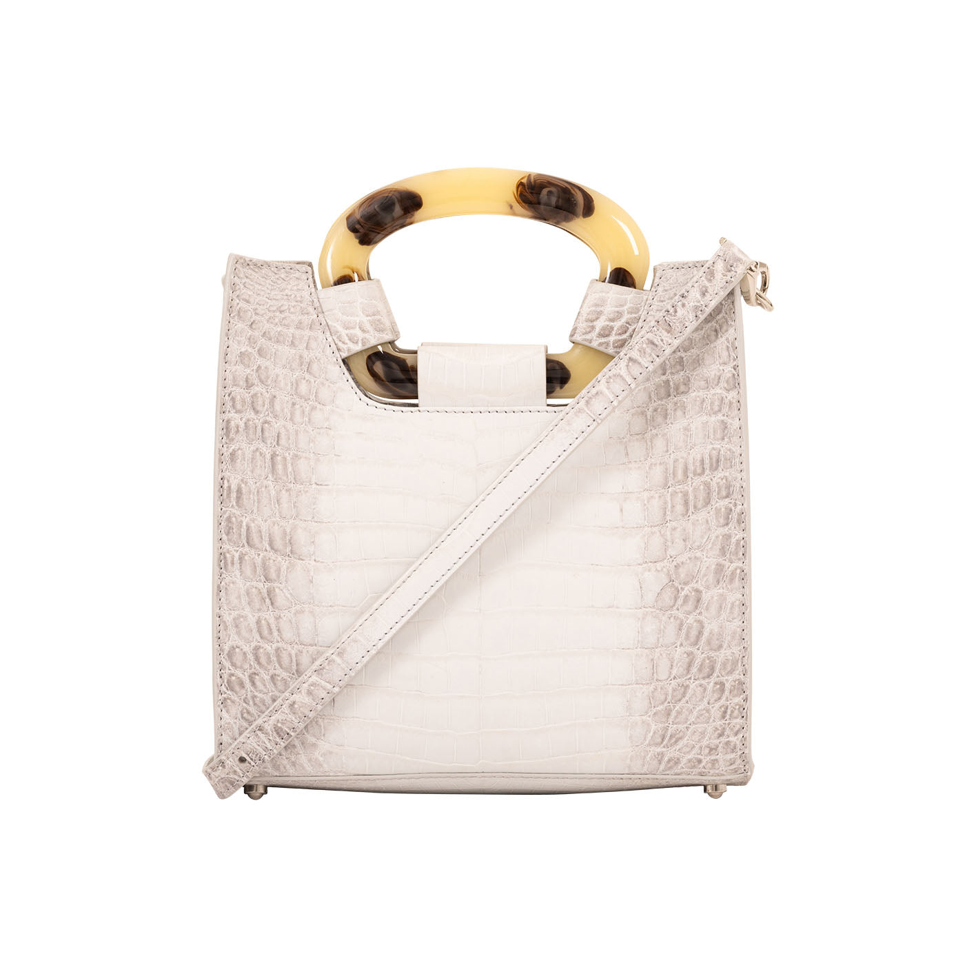 White textured handbag with a strap on a white background