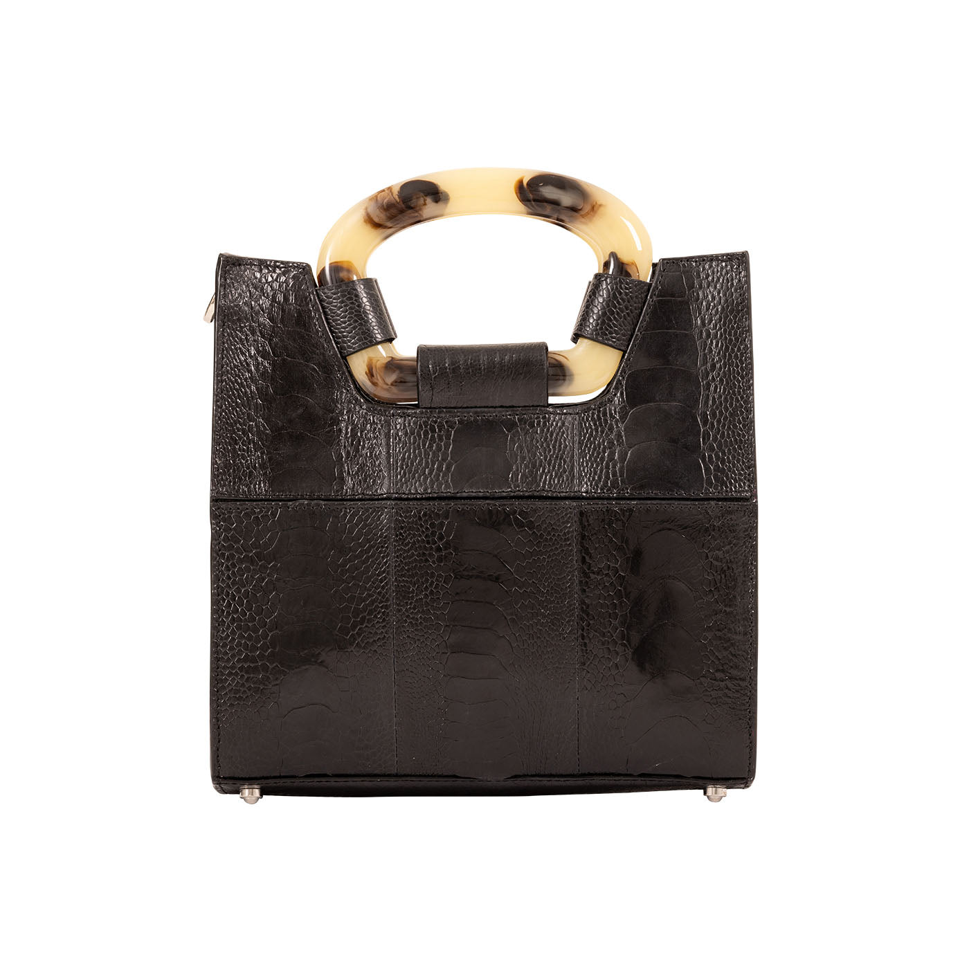 Back of a  textured handbag on a white background