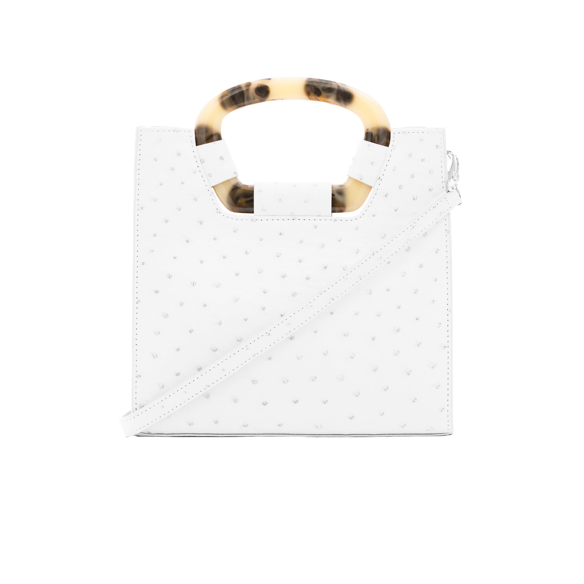 Fron of a white ostrich textured handbag with a strap on a white background