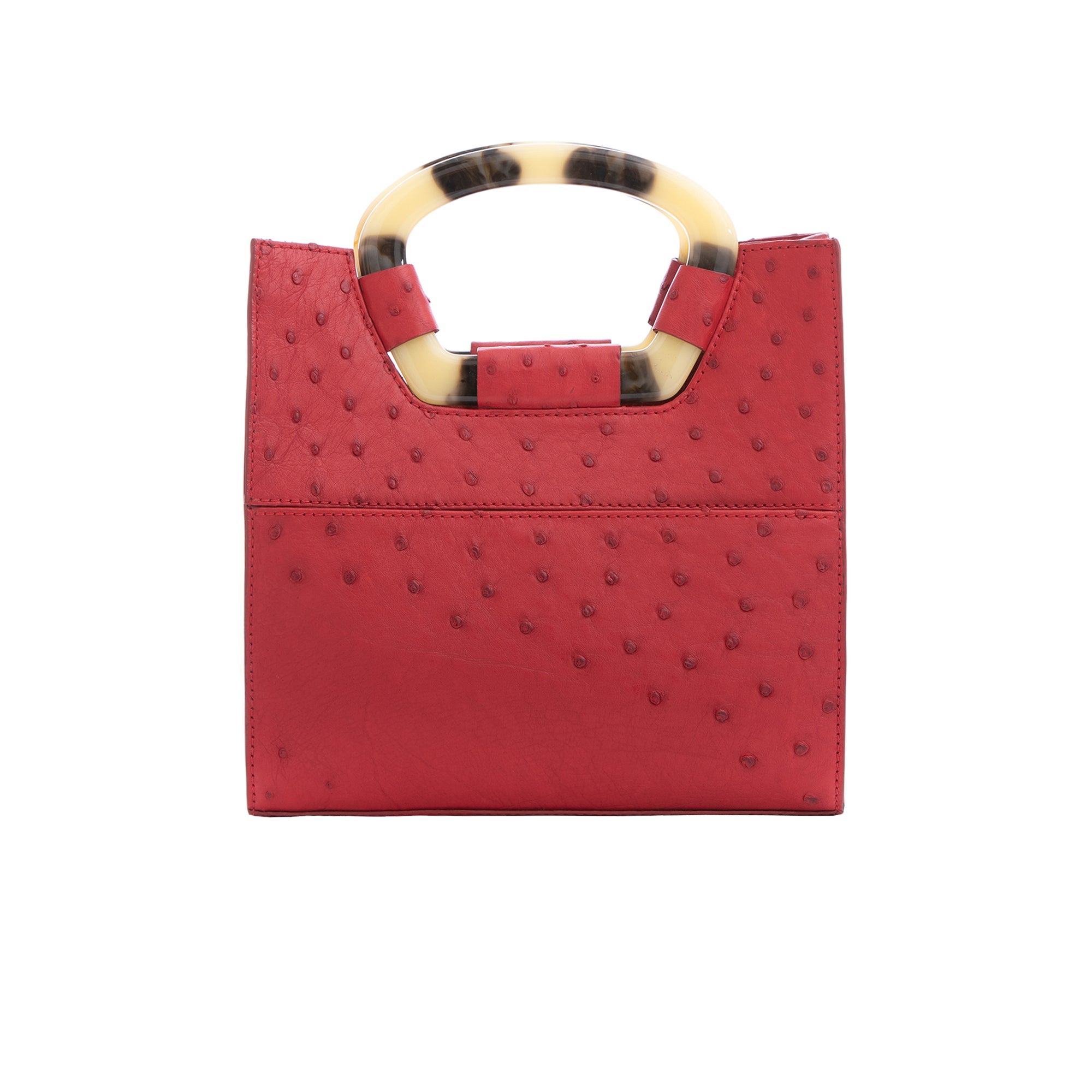 Back of a red ostrich textured handbag on a white background