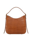 Cognac crocodile-patterned handbag on a white background