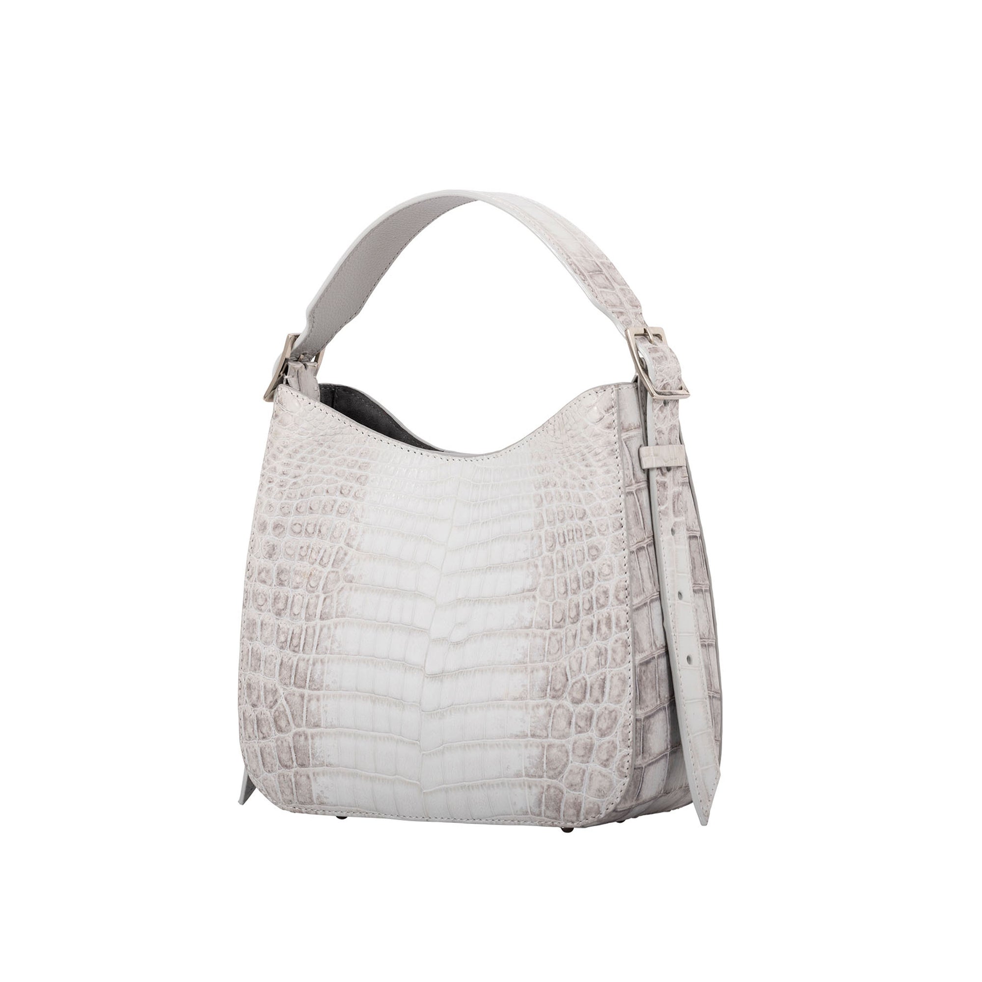 White crocodile-patterned handbag on a white background