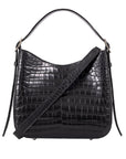 Front of a black crocodile textured handbag with a strap on a white background