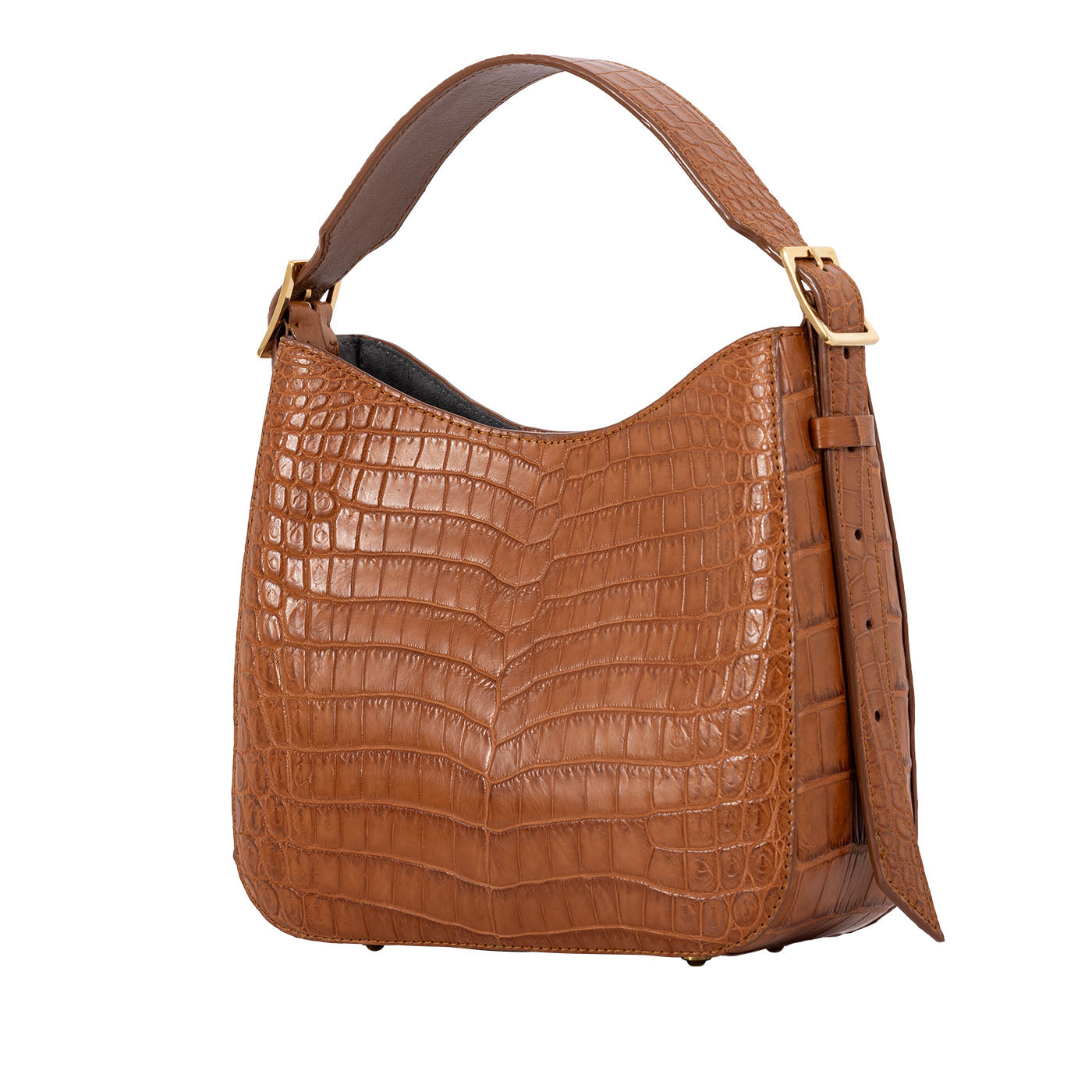 Side of a brown crocodile textured handbag on a white background