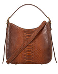 Front of a brown caramel python textured handbag with a strap on a white background