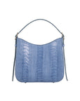 Front of a blue textured handbag on a white background
