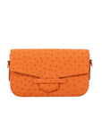 Front of a tangerine ostrich textured clutch bag on a white background