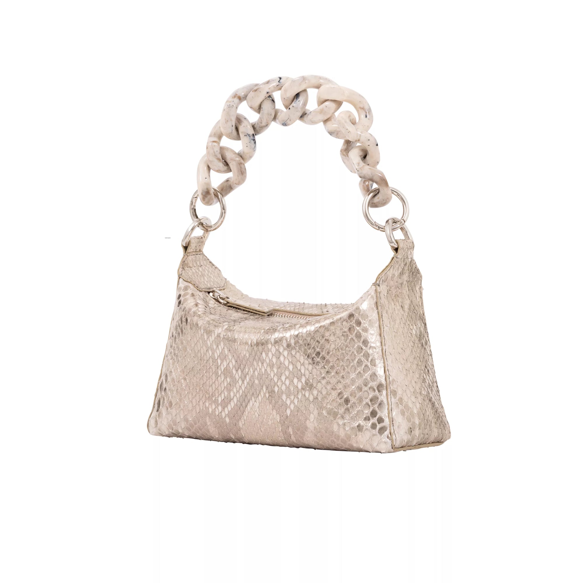 The side of a gold shimmer python textured handbag on a white background