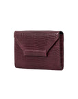 Side of a maroon crocodile textured clutch bag on a white background