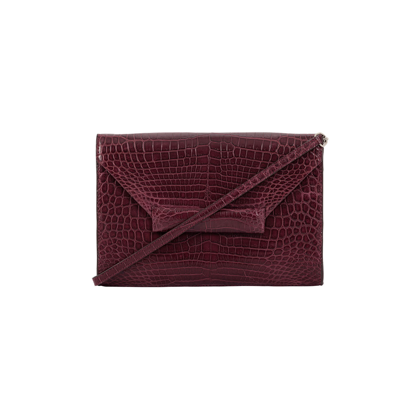 Front of a maroon crocodile textured clutch bag with a strap on a white background