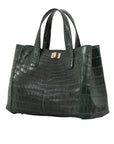 Green crocodile-textured tote bag on a white background
