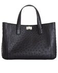 Front of a black ostrich textured handbag on a white background