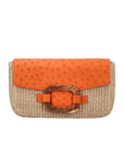 Side of a tangerine and beige ostrich and woven handbag on a white background