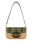 Front of a forest green and beige woven handbag with a strap on a white background
