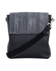 Black textured messenger bag with strap on a white background