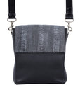 Black textured messenger bag with strap on a white background