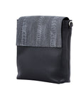 Black textured messenger bag on a white background