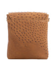 Brown ostrich textured messenger bag on a white background