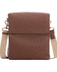 Front view of kango ostrich textured messenger bag on a white background