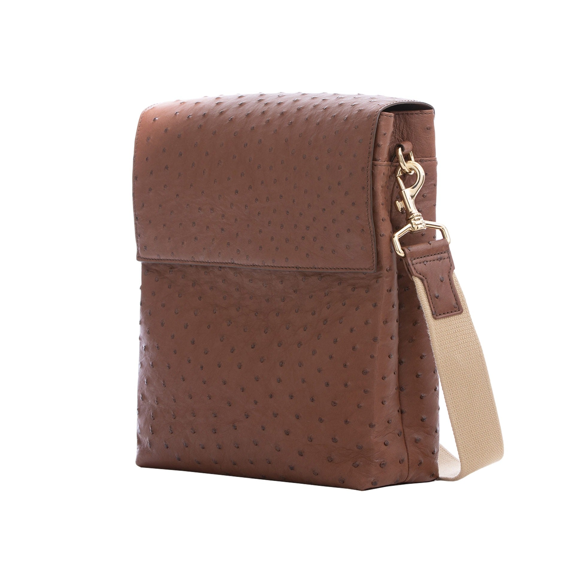 Side view of kango ostrich textured messenger bag on a white background