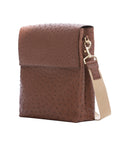 Side view of kango ostrich textured messenger bag on a white background