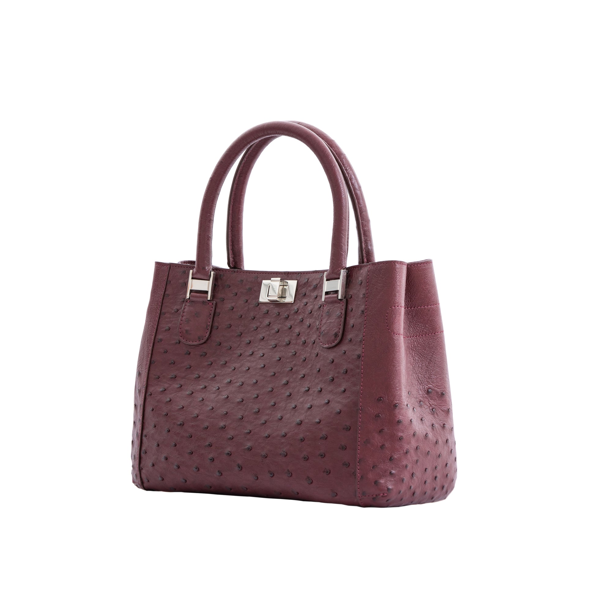 Maroon handbag with a textured pattern on a white background
