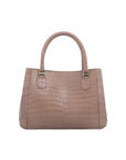 Brown handbag with crocodile texture on a white background
