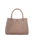 Beige handbag with crocodile texture on a white background