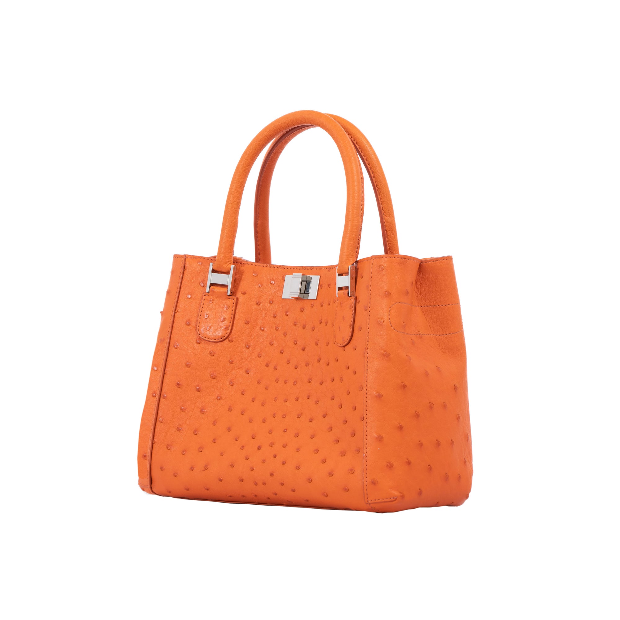 Orange handbag with a textured pattern on a white background