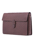 Side view of ostrich textured briefcase on a white background