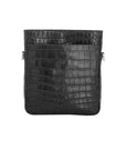 Black crocodile bag on a white background